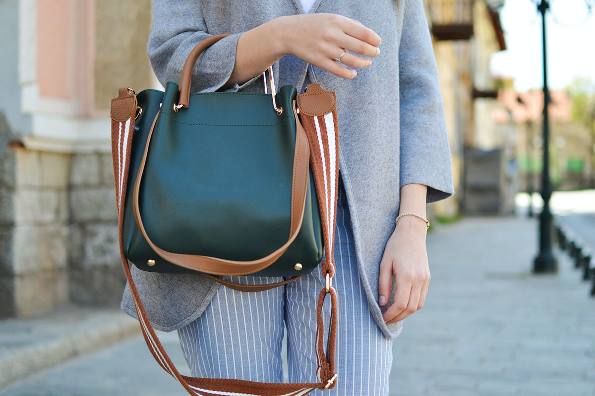 A girl with a stylish crossbody bag 