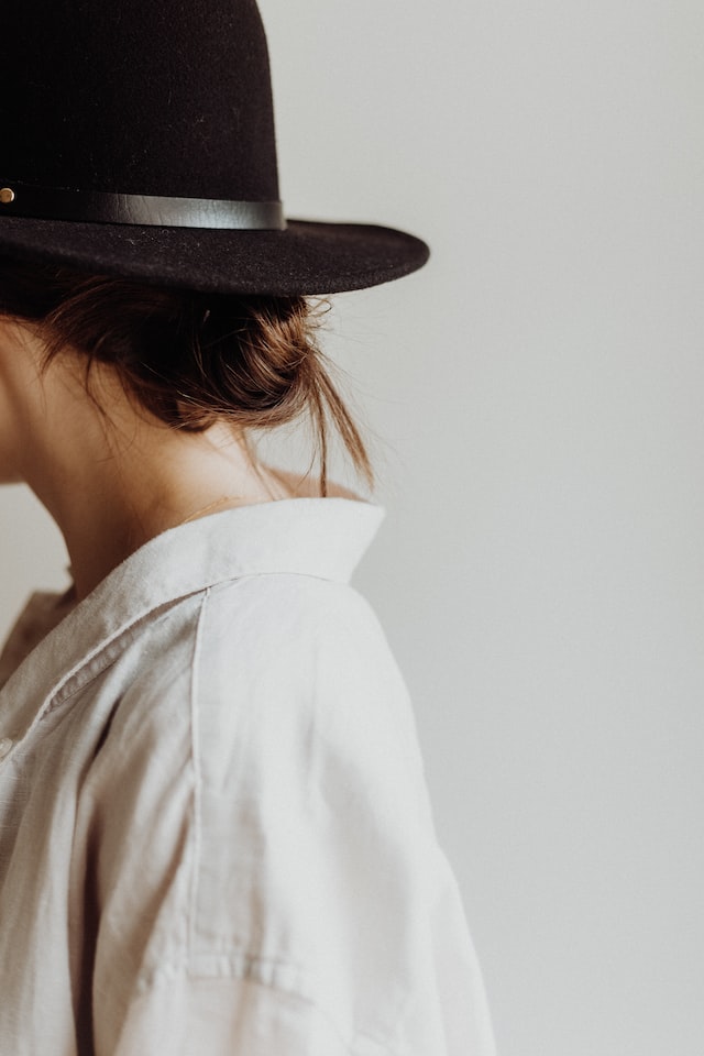 white-linen-shirt A woman wears a white linen shirt