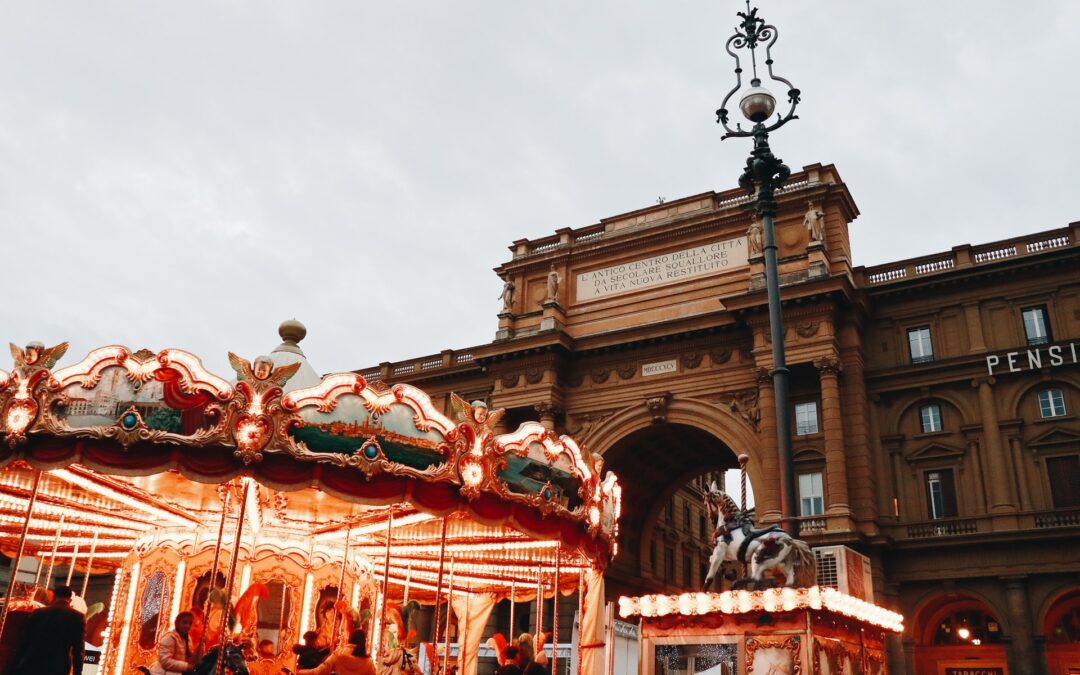 People have fun at the carousel in Florence