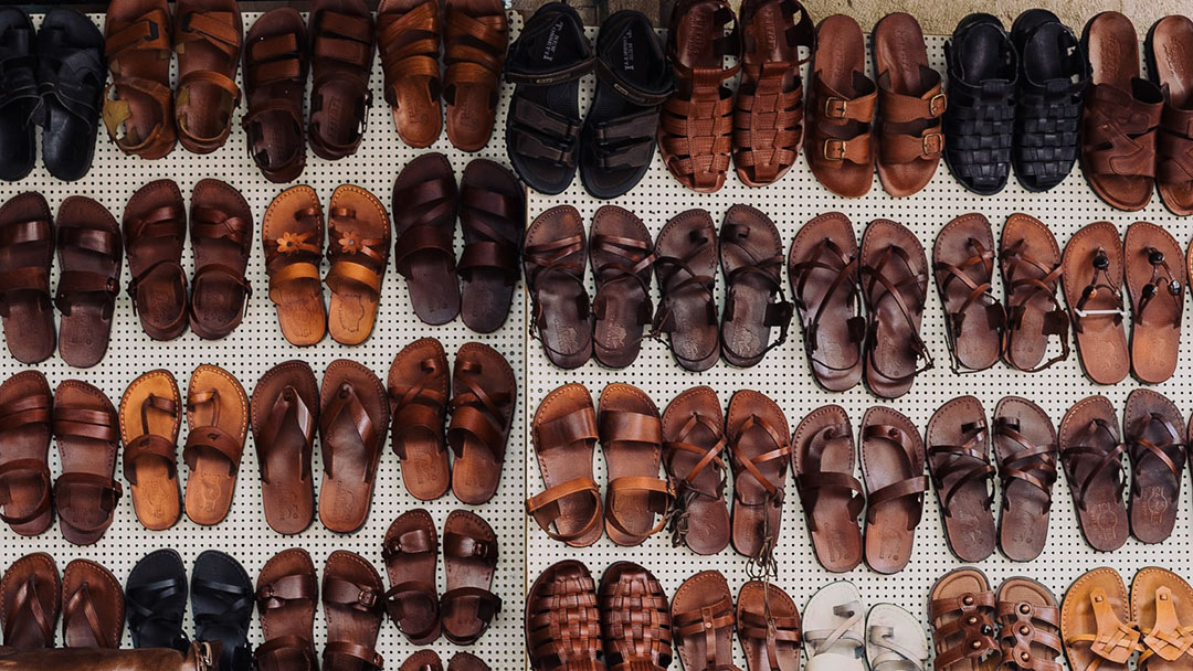 Different leather sandals on display 