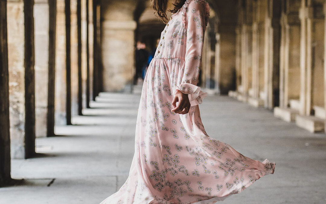 A woman wearing a pink chiffon dress in Florence