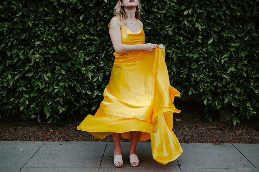 A Florentine girl wears a trendy yellow dress