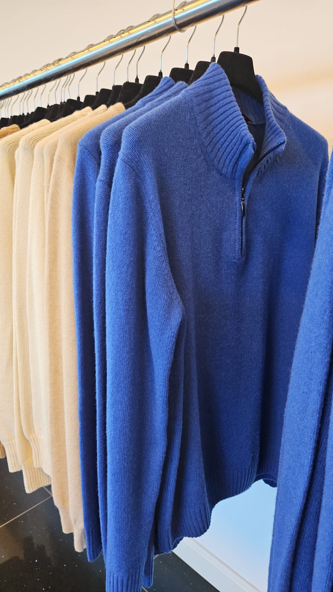 Cashmere sweaters on display at a factory outlet in Florence