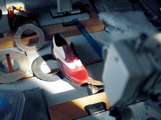 In Milan an artisan is making custom shoes for a client