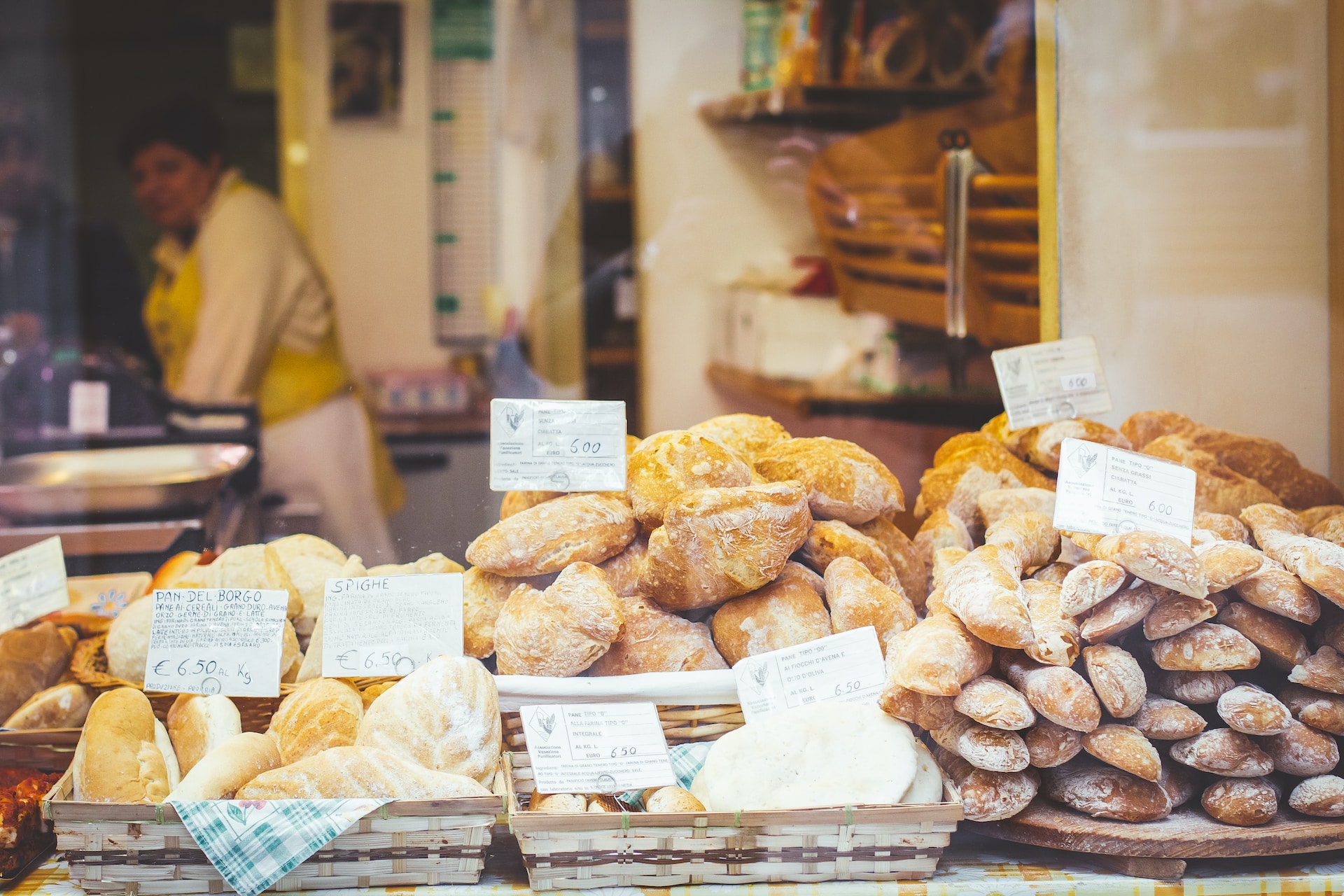 Different kinds of bread on display at a bakery in Florence