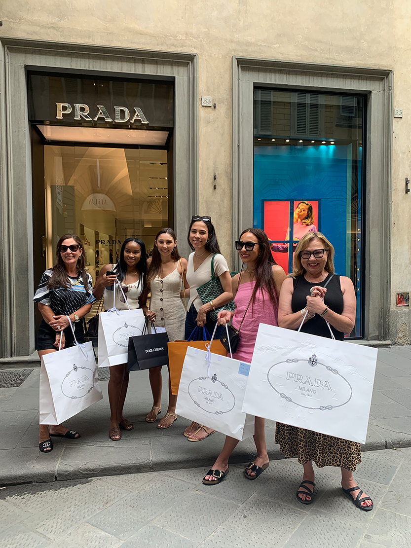 Group of customers enjoying luxury fashion shopping in Florence