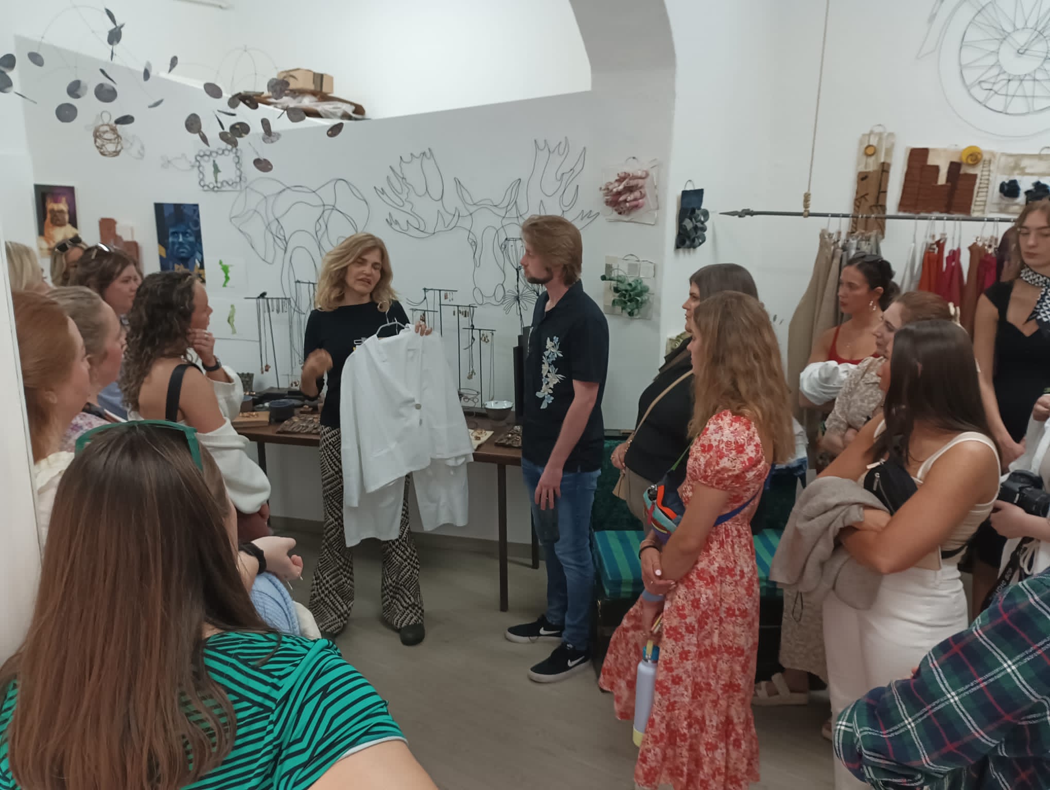 milan-artisan-visit Fashion designer during a shopping tour in Milan, Italy