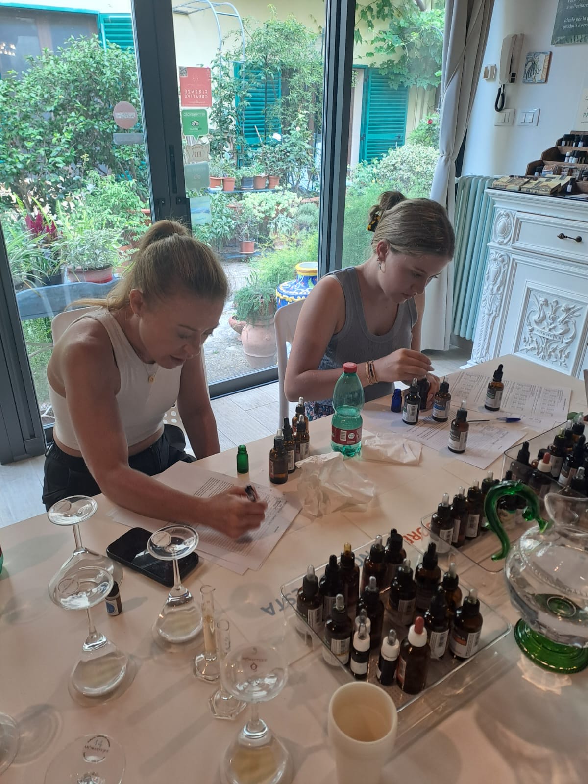 Students focused duting a perfume class in Florence, Italy