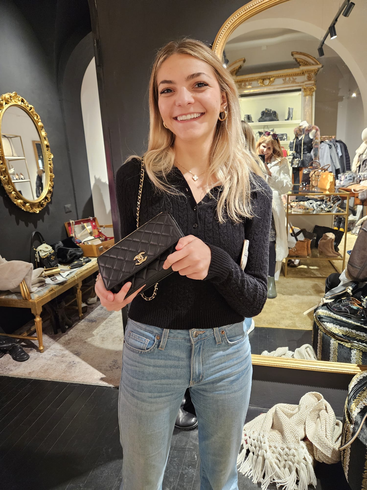 A customer with her newly purchased Chanel bag in Florence